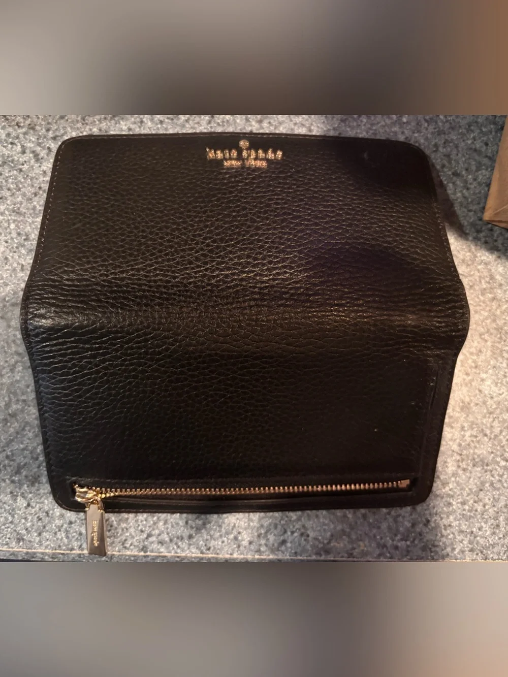 kate spade black pebbled leather clutch wallet with gold logo